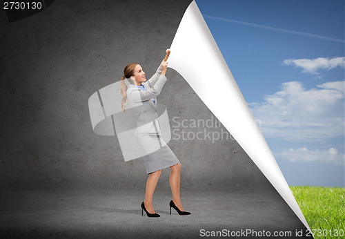 Image of smiling businesswoman changing sceneries