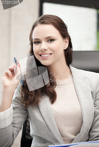 Image of happy woman with documents