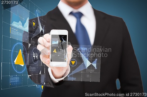 Image of businessman showing smartphone with virtual screen