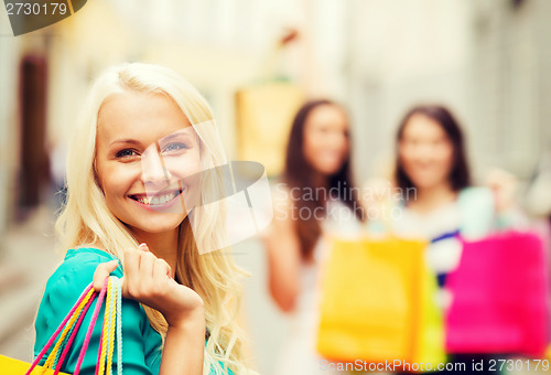 Image of girls with shopping bags in ctiy
