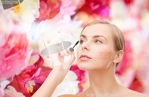 Image of beautiful woman with mascara