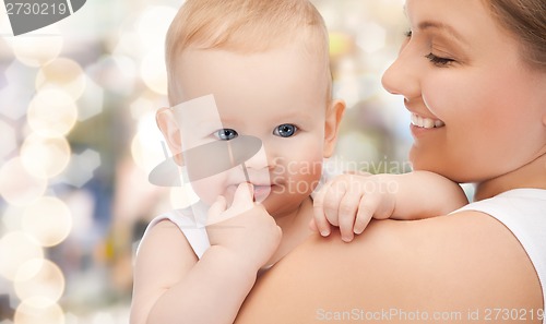 Image of happy mother with adorable baby