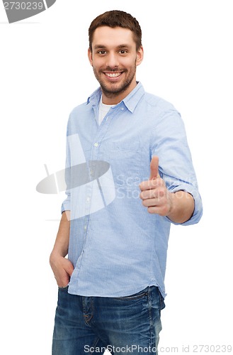 Image of smiling man showing thumbs up