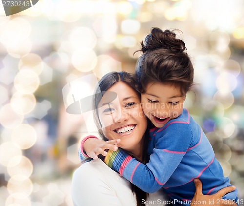 Image of hugging mother and daughter