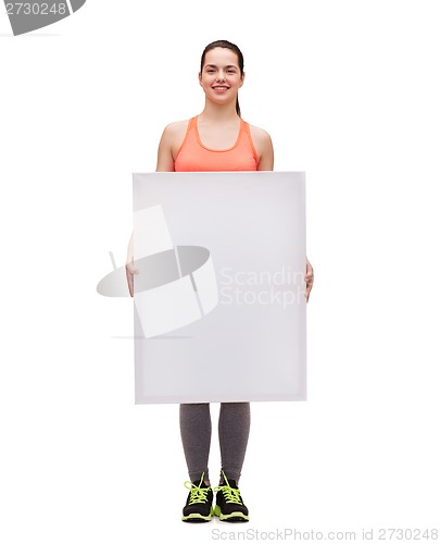 Image of teenage girl in sportswear with white board