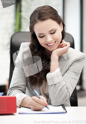 Image of happy woman with documents