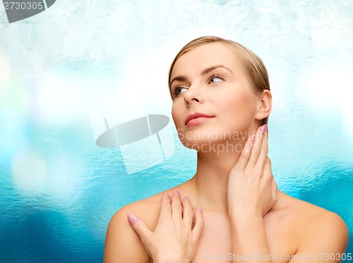 Image of face and hands of beautiful woman