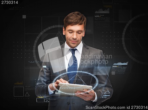 Image of buisnessman with tablet pc