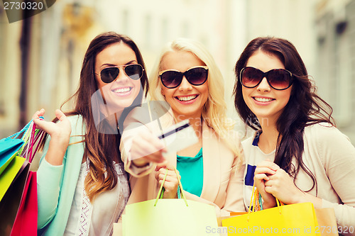 Image of girls with shopping bags in ctiy