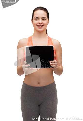 Image of sporty woman with tablet pc blank screen