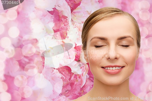 Image of face of beautiful woman with closed eyes