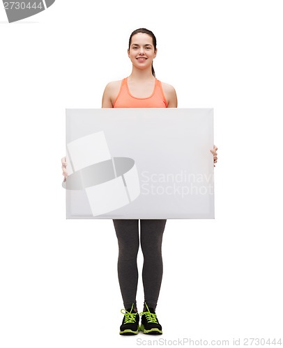 Image of teenage girl in sportswear with white board