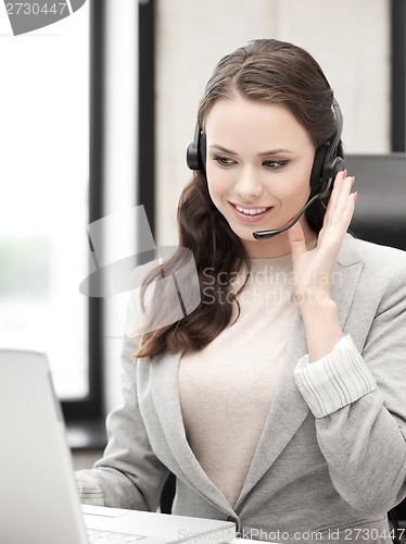 Image of friendly female helpline operator