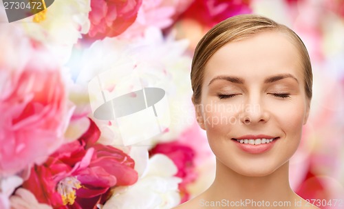 Image of face of beautiful woman with closed eyes