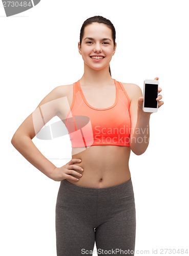 Image of sporty woman with smartphone