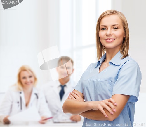 Image of smiling female doctor or nurse