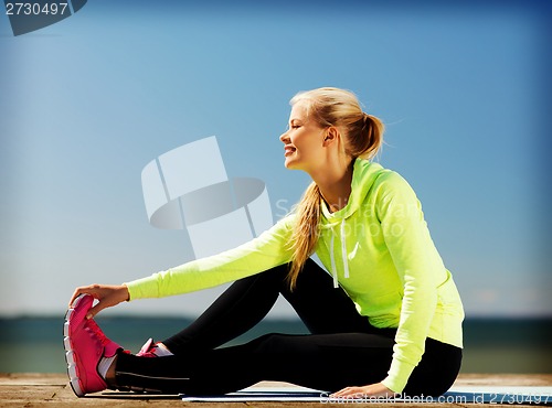 Image of woman doing sports outdoors