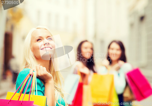 Image of girls with shopping bags in ctiy