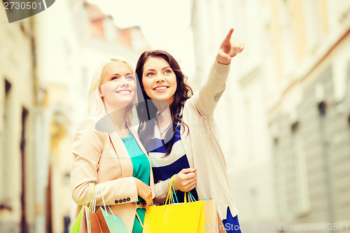 Image of girls with shopping bags in ctiy