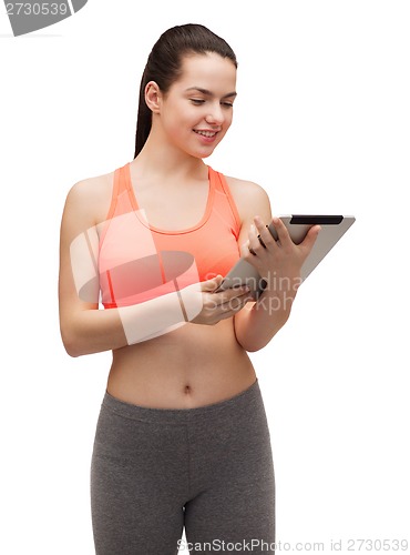 Image of sporty woman with tablet pc computer