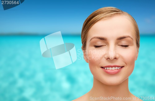 Image of face of beautiful woman with closed eyes