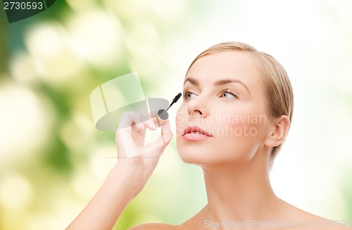 Image of beautiful woman with mascara