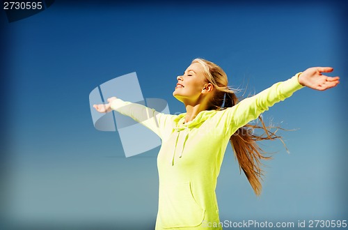 Image of woman doing sports outdoors