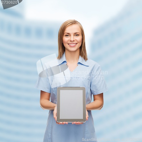 Image of smiling female doctor or nurse with tablet pc