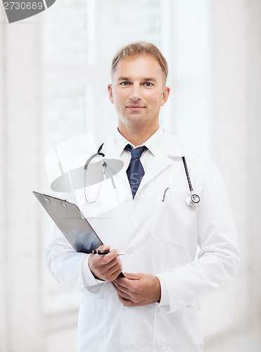 Image of male doctor with stethoscope and clipboard