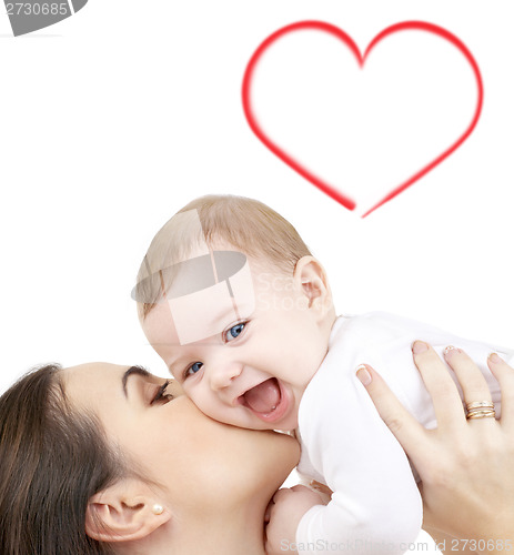 Image of laughing baby playing with mother