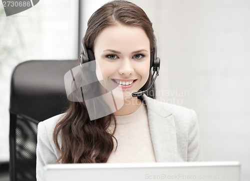 Image of friendly female helpline operator