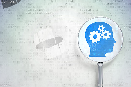 Image of Marketing concept:  Head With Gears with optical glass on digital background