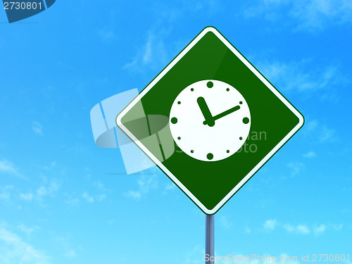 Image of Timeline concept: Clock on road sign background