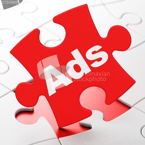 Image of Marketing concept: Ads on puzzle background