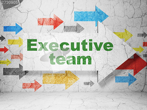 Image of Business concept: arrow with Executive Team on grunge wall background