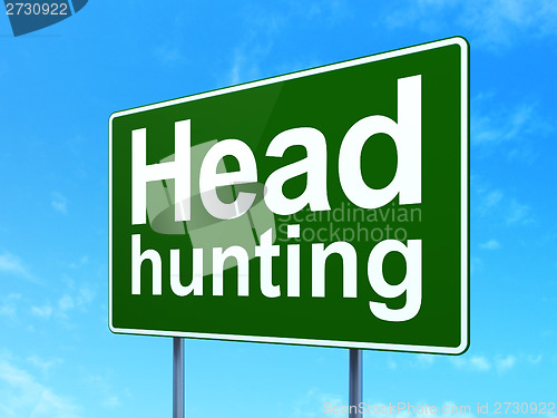 Image of Business concept: Head Hunting on road sign background