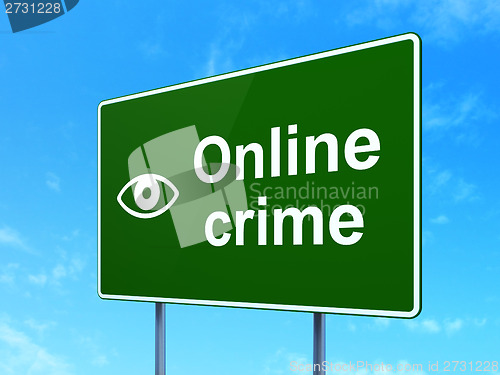 Image of Security concept: Online Crime and Eye on road sign background