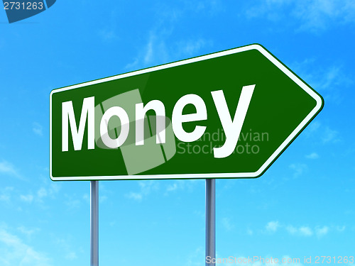 Image of Finance concept: Money on road sign background