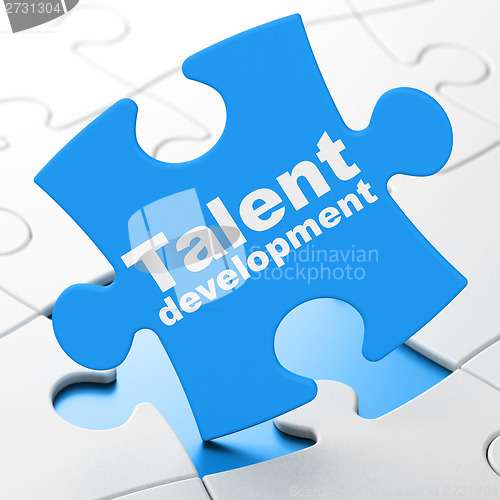 Image of Education concept: Talent Development on puzzle background