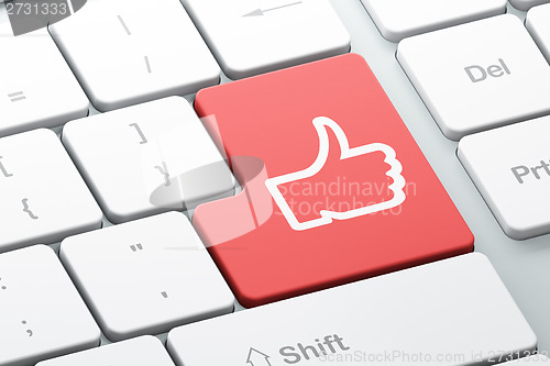 Image of Social network concept: Thumb Up on computer keyboard background