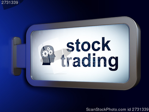 Image of Business concept: Stock Trading and Head With Gears on billboard background