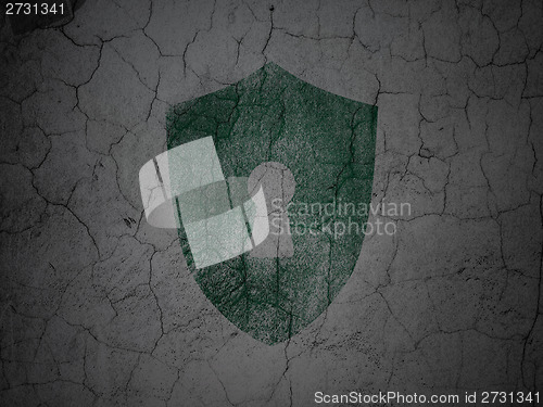 Image of Protection concept: Shield With Keyhole on grunge wall background