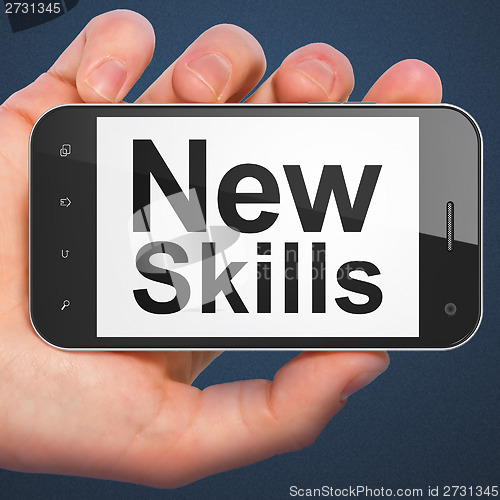 Image of Education concept: New Skills on smartphone