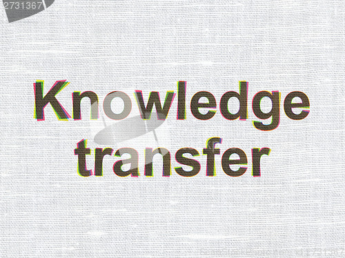 Image of Education concept: Knowledge Transfer on fabric texture background