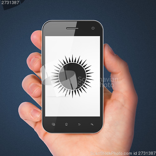Image of Travel concept: Sun on smartphone