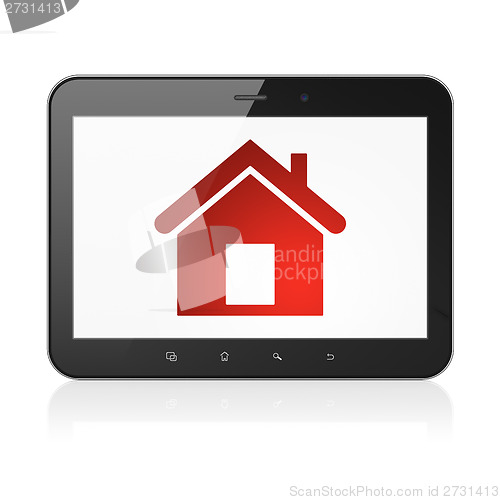 Image of Finance concept: Home on tablet pc computer