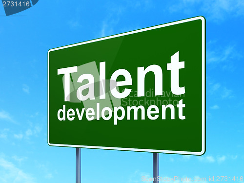 Image of Education concept: Talent Development on road sign background