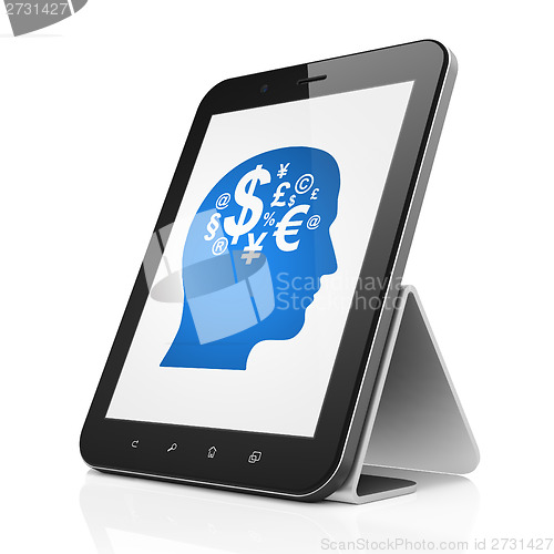Image of Education concept: Head With Finance Symbol on tablet pc computer