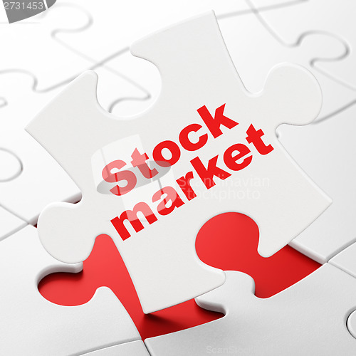 Image of Business concept: Stock Market on puzzle background