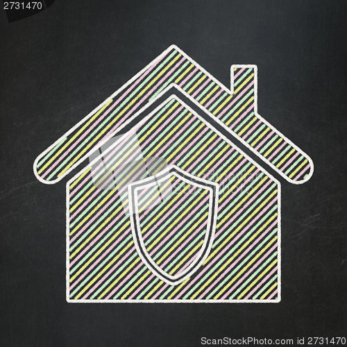 Image of Privacy concept: Home on chalkboard background